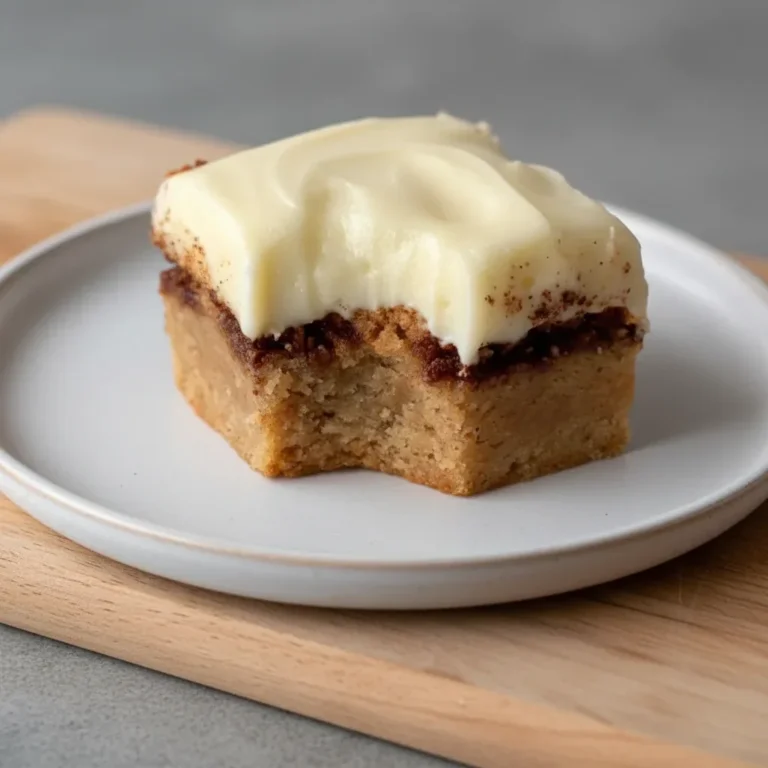 Chewy Cinnamon Roll Blondies with Cream Cheese Icing